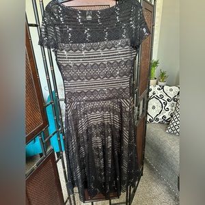 Sangria black lace with nude Uber skirt, sz 10 can fit 12